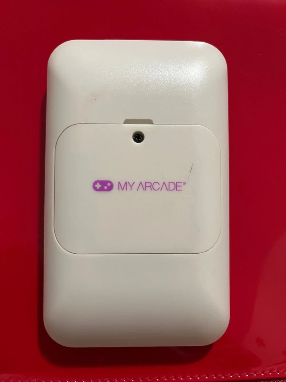 Arcade GO GAMER White Handheld Console with Black D-pad and Purple Buttons